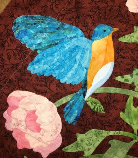 Figure 13 appliqued bird with outspread wings